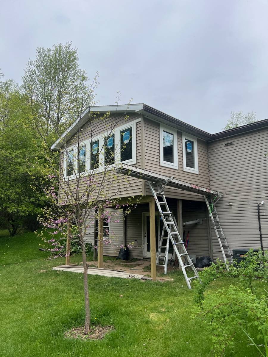 Home exterior in Grand Rapids with several new Alside replacement windows installed